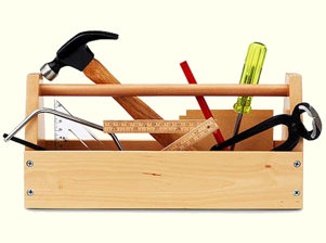 Carpenter Tools in a wooden tool box.