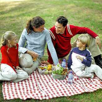 Mother, father, daughter, son - family picnic.