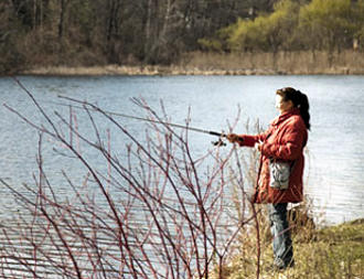 Woman fishing.