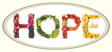 The letters H O P E spelled out with fresh fruits and vegetables.