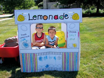 Young boys selling lemonade.