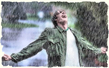 Man in the rain, and enjoying it.