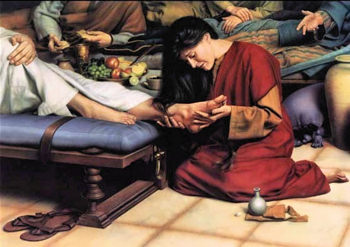 Mary, washing the feet of Jesus.