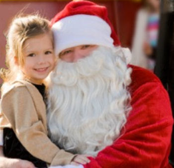 Young girl and Santa Claus.