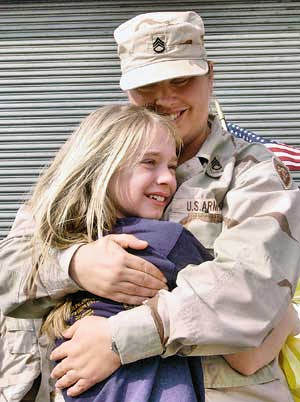 Soldier and young girl's reunion.