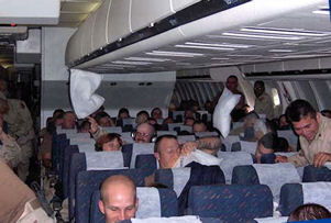 Airplane with soldiers onboard.