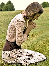 Young woman praying.